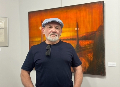 Игорь Панченко иусумҭақәа рцәыргақәҵа аатит ахатәы галереиа The Wall Gallery аҿы.